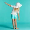 Chapeau Anti UV Bébé Réversible Rose Clair Et Imprimé Fleurs -Aqua Soldes chapeau anti uv bebe reversible rose clair et imprime fleurs